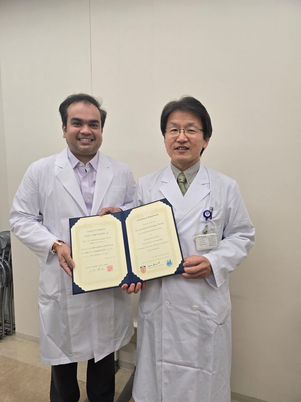 Dr Surakshith T K receiving his GI endoscopy training certificate from Professor Hironori Yamamoto at Jichi Medical University Hospital, Japan